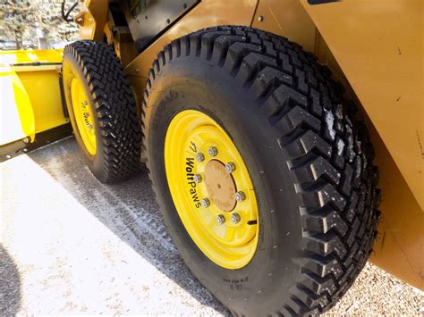 snow paws skid steer tires|wolf paws skid steer.